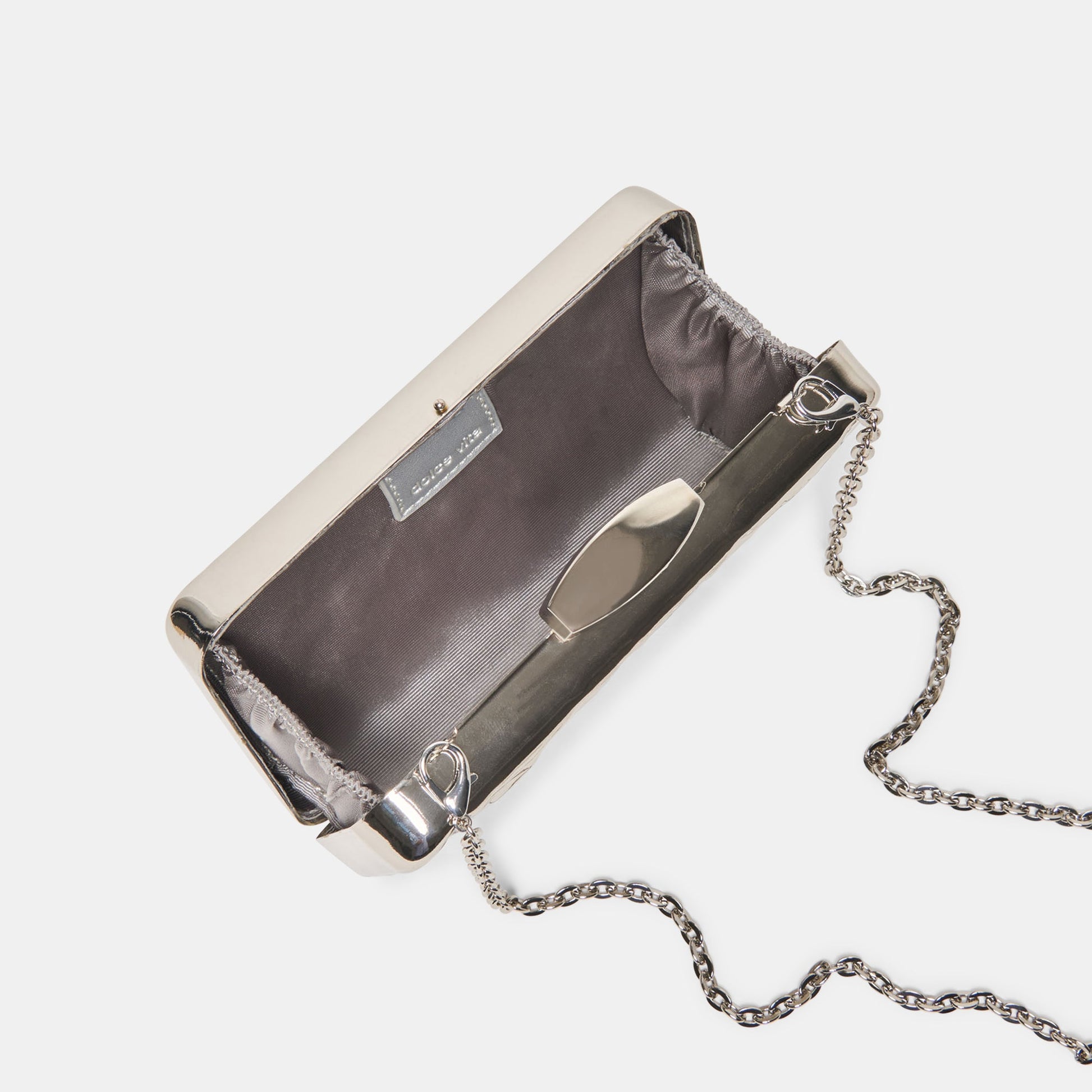 Delia Silver Metal Clutch Dolce Vita For sale